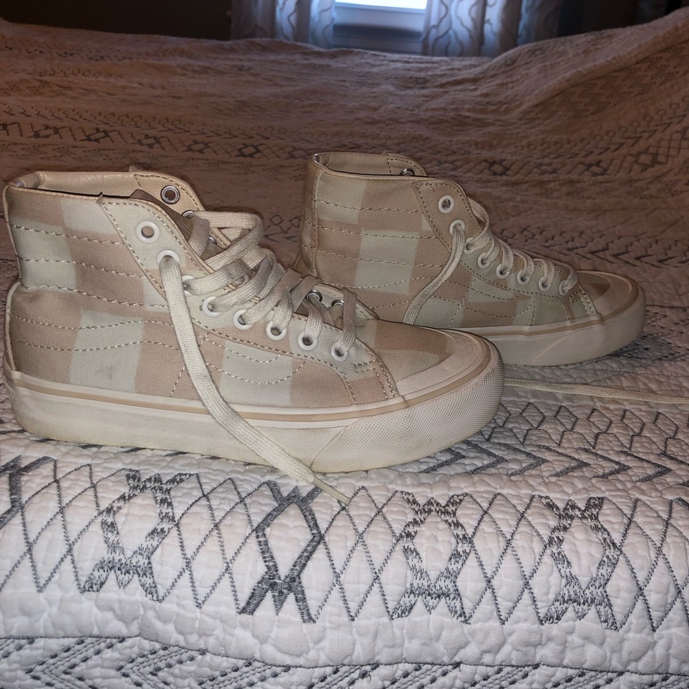 woman’s pink checkered vans